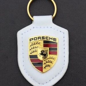 White Porsche key fob crest